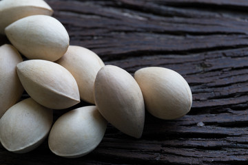 Ginkgo biloba (seeds) on the background wood.