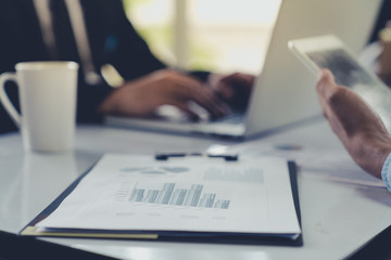 The document graph summary financial enterprises on the conference table in office company