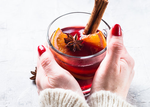 Woman hold Mulled wine