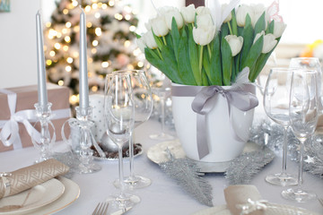  Elegant dining table and Christmas tree in living room