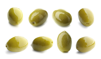 Green tasty olives on white background