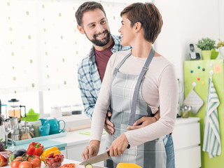 Loving couple cooking together