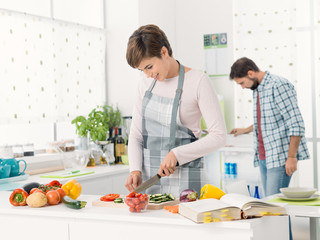 Couple preparing lunch together at home