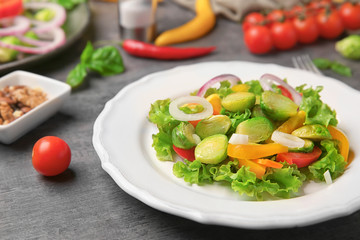 Plate of salad with Brussels sprouts on table