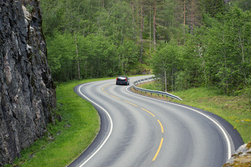 empty winding forest road