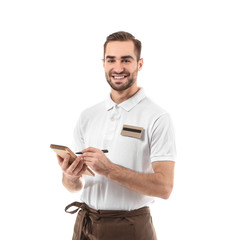 Handsome waiter writing down order, on white background