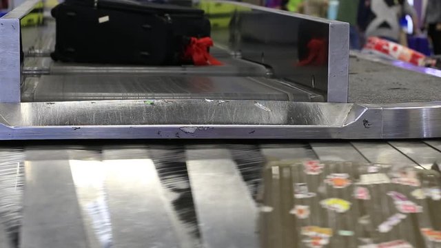 BANGKOK, THAILAND - NOVEMBER 02, 2017 : Baggage conveyor belt in the Suvarnabhumi Airport carrying the passenger luggage.