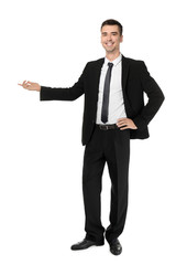 Attractive young man in formal wear on white background