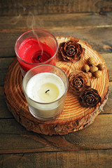 Relaxing candles on wood