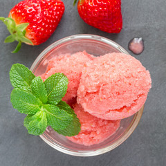 Homemade strawberry sorbet in glass, top view, square