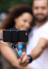 Naklejka premium Happy traveling couple making selfie, romantic mood.
