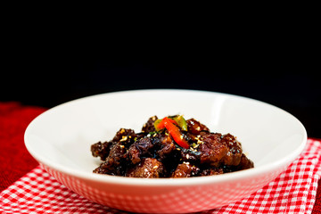 wok fried pork stir fry with sweet peppers and chinese vegetables