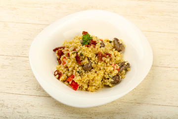 Bulgur with chicken hearts