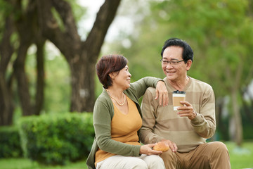 Aged couple resting in park