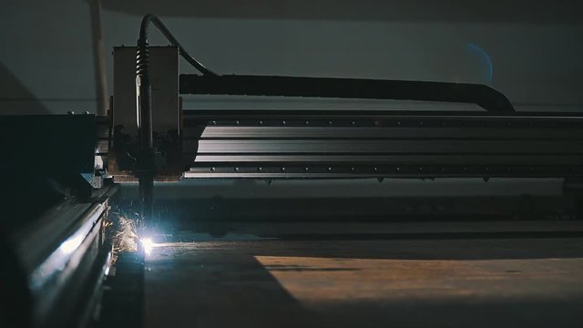 Manufacturing process cutting metal sheet in modern electronic equipment