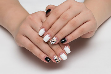 white black manicure with a delicate design of stripes, sequins, geometry on square nails
