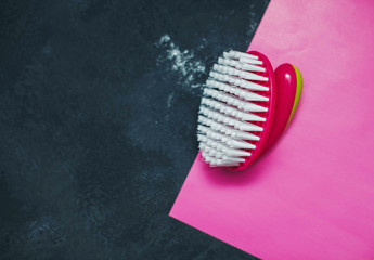 Fototapeta na wymiar Oval pink clothes brush