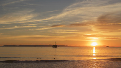 Beach sunset landscape with Catalina Island in the background