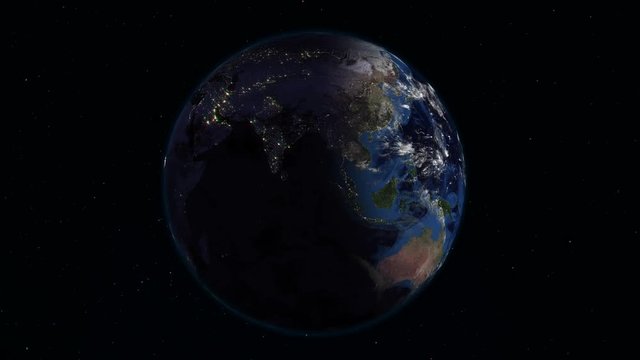 Realistic Earth rotating in space (loop). On the planet Earth is visible the change of day and night