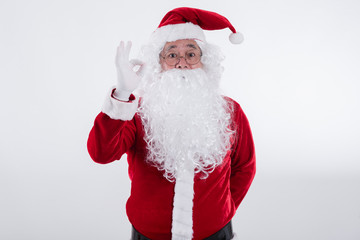 Portrait of a happy Santa cross on a white background, Winter holiday, Merry Christmas and happy new year concept