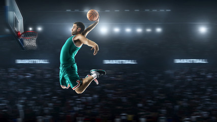 Fototapeta na wymiar one basketball player jump in stadium panorama view