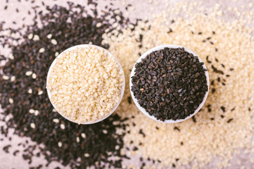 Black and white sesame seeds. Copy space. Top view.