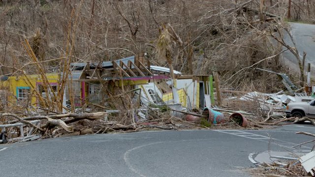 view of destroyed restaurant and cars on Bordeaux mountain, st John, hurricane Irma
