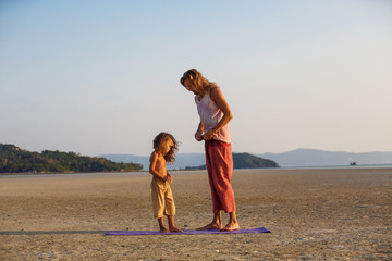 Father with son on the beach