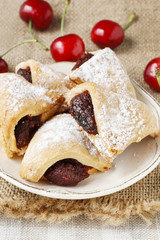 Biscuits filled with cherry jam