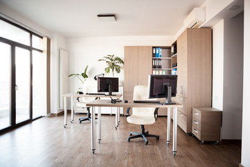 Large angle view. Interior of an empty modern office. Business and workplace
