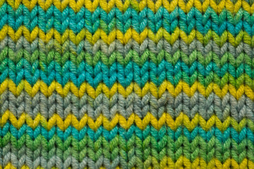 Fototapeta na wymiar knitted fabric background texture green