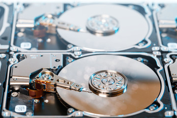Obraz premium Server hard disks, illuminated optical fiber with blurred lights
