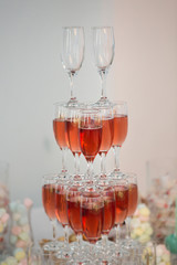 Slide glasses of champagne with a cherry on the wedding party. Ice cold.