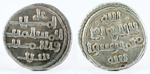 Ancient medieval silver quirat coin of Almoravids. Minted in the ancient Al-Andalus at present...