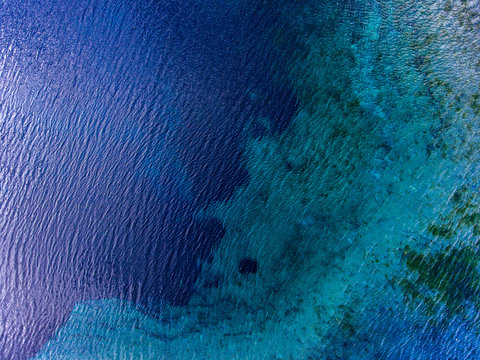 Aerial view of the karst lake named Goluboye Ozero (Blue Lake) surrounded by forest. Maximum depth is 18m (60ft). Lake is situated near the city of Kazan, Russia