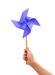 Kid hand holding a blue pinwheel close up isolated on white background.