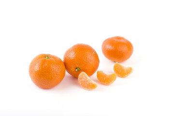 fresh mandarines isolated on white background. Oranges are arranged in rows. Placed on a white background.