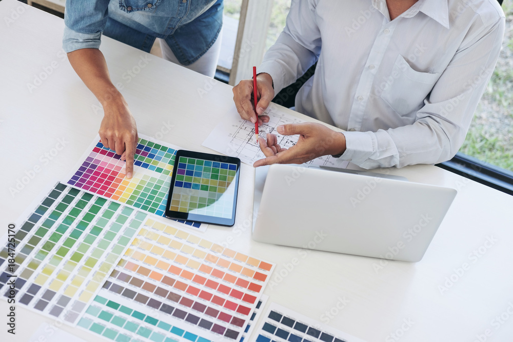 Poster two young interior design or graphic designer working on project of architecture drawing with work t
