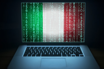 Italian hacker. Laptop with binary computer code and Italy flag on the screen. Internet and network...