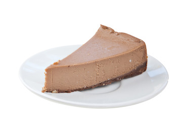 chocolate cheesecake on white plate on  wooden table