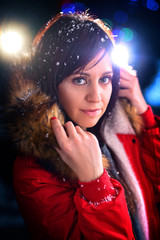 Fototapeta premium young girl in a fashionable jacket in a winter day