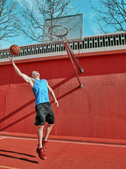 man on the street plays basketball