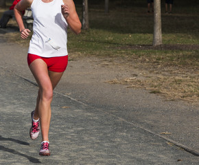 High school cross country runner on gravel