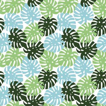 monstera blue, light green and dark green leaves tropical summer paradise pattern on a white background seamless vector