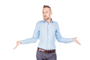 Serious businessman having no ide raised his hands isolated on white background.