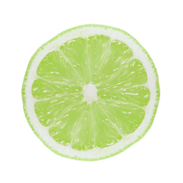 Green lime slice isolated on white. 