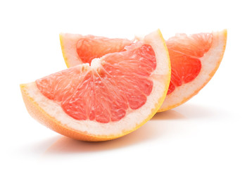 Fototapeta na wymiar Two red grapefruit slices isolated on white background.