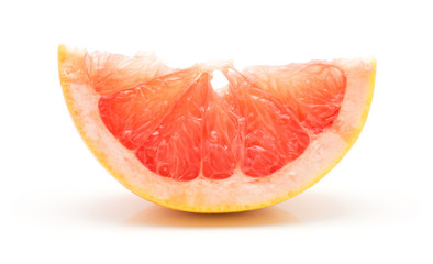 Fototapeta na wymiar Red grapefruit slice isolated on white background.