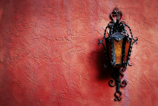 Lamp On Red Stucco Wall