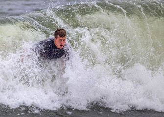 Young Man Bodysurfing